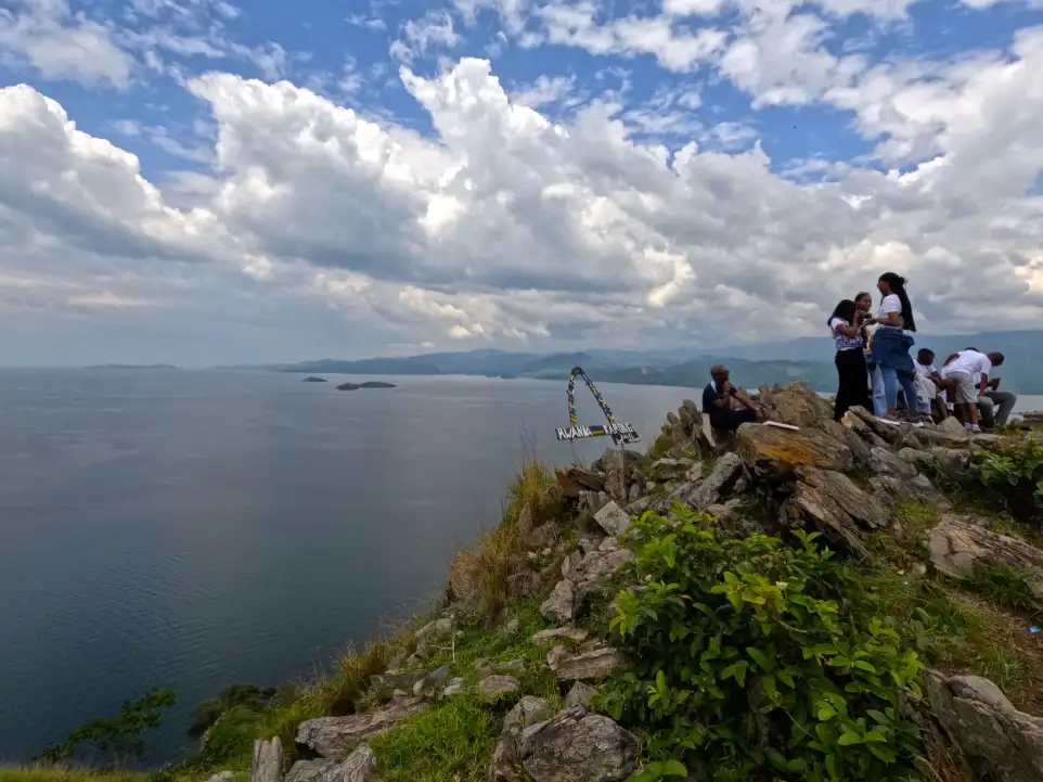 Guest overlooking lake kivu views on top of the tallest island in Lake Kivu