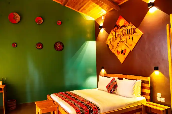 Private eco lodge bedroom overlooking Lake Kivu