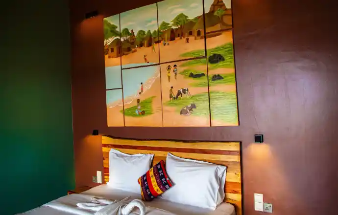 Private eco lodge bedroom overlooking Lake Kivu