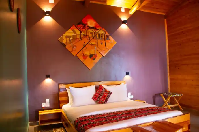Private eco lodge bedroom overlooking Lake Kivu