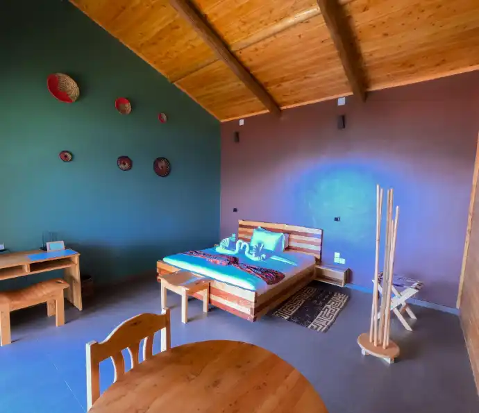 Private eco lodge bedroom overlooking Lake Kivu