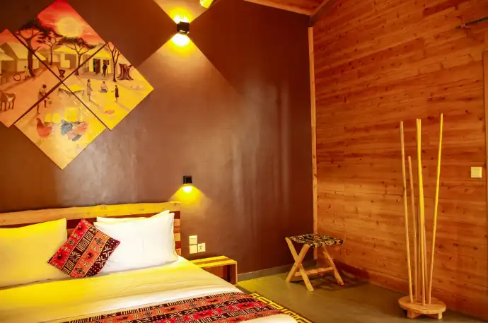 Private eco lodge bedroom overlooking Lake Kivu