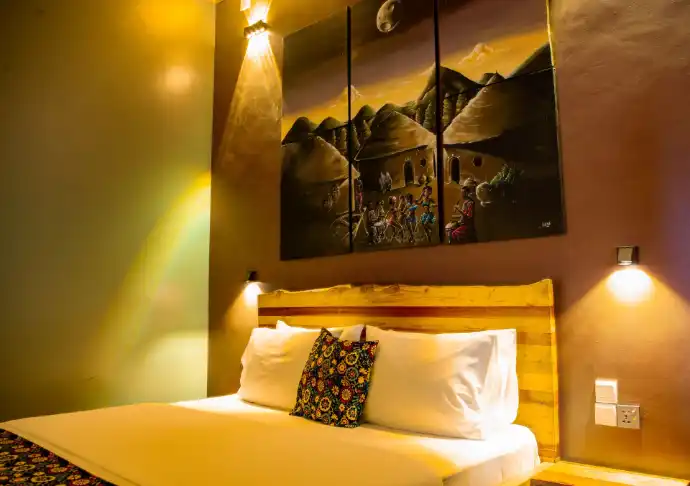 Private eco lodge bedroom overlooking Lake Kivu