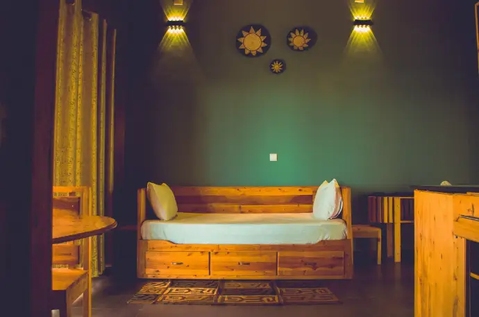 Private eco lodge bedroom overlooking Lake Kivu