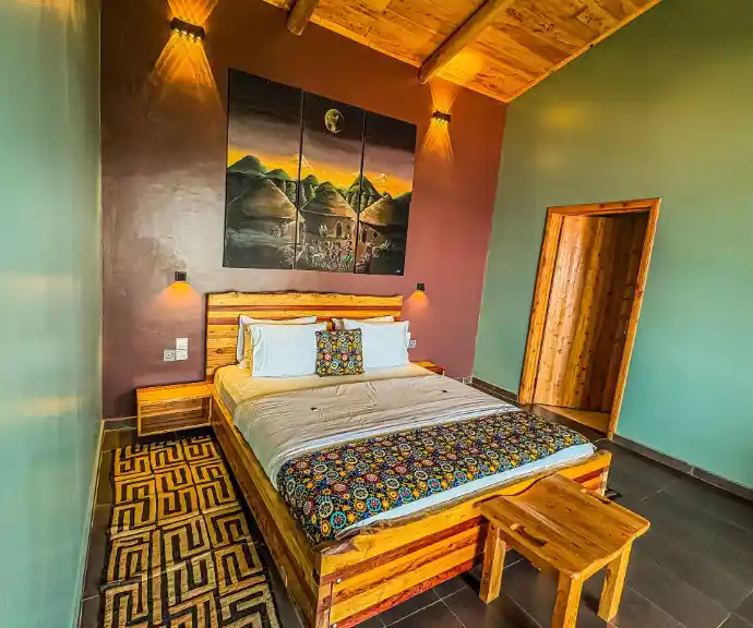 Private eco lodge bedroom overlooking Lake Kivu