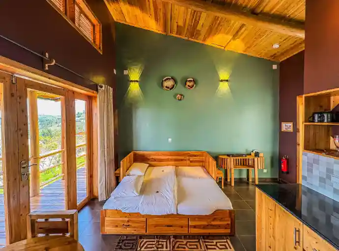 Private eco lodge bedroom overlooking Lake Kivu